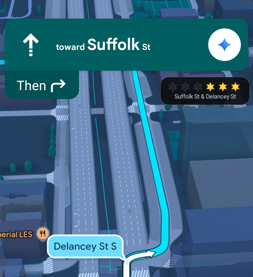 The Wanted Level badge, showing three stars at Suffolk St and Delancey St, floating over Google Maps navigation